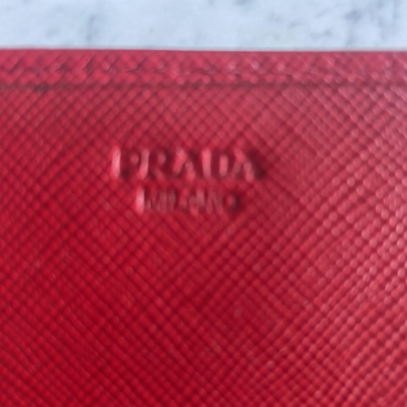 Prada Red Saffiano leather wallet with a bow accent. - Picture 4 of 5